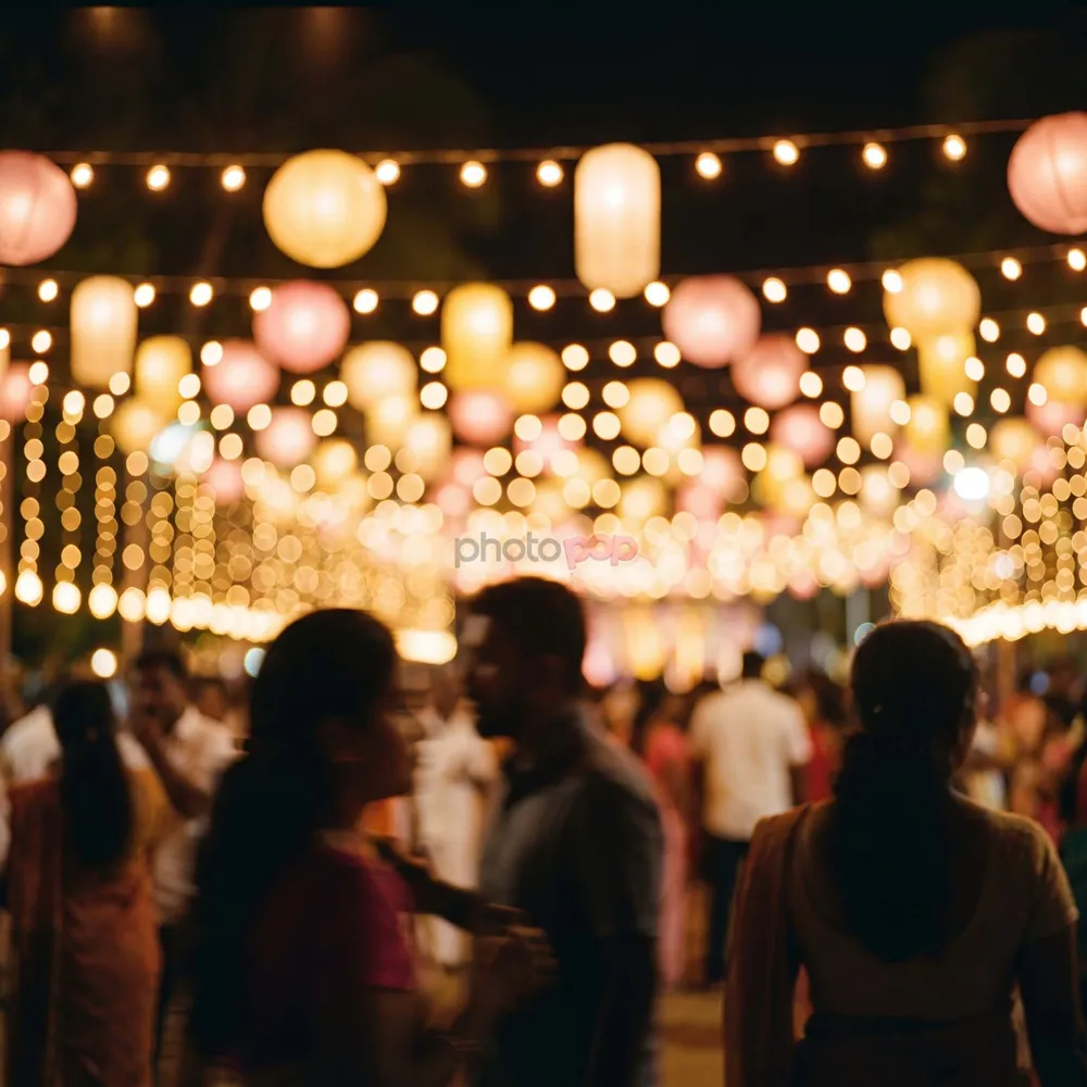 Glowing paper lanterns and string lights above an evening festival crowd seen in silhouette